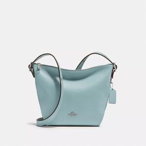 Coach Small Dufflette bag in light blue pebbled leather.
